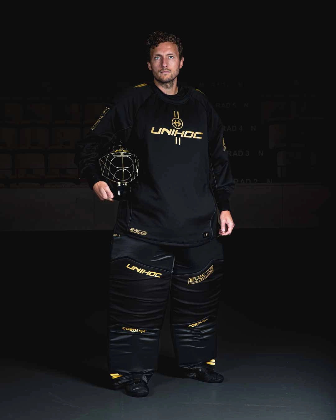 Unihoc Målmandsmaske ALPHA PRIME EVOLAB Sort/Guld 26/27